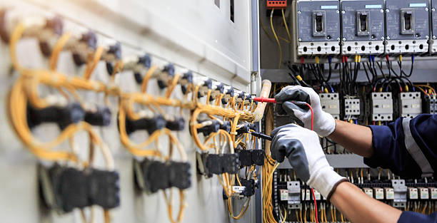 Professional Electrician technician working in Cienegas Terrace, TX